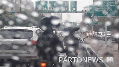 What is the rainfall and high volume of traffic / "busy" thoroughfares of the capital?