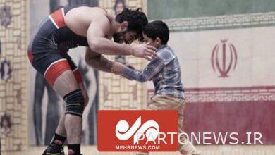 Hassan Yazdani wrestling with the son of Martyr Sadrzadeh, Martyr Defender of the Shrine - Mehr News Agency  Iran and world's news