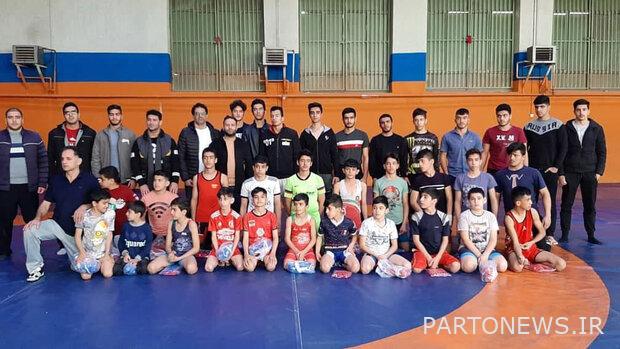 The national wrestling champions visited the spinal cord injury athlete