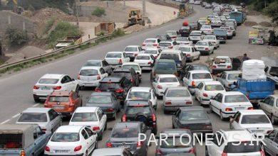 Heavy traffic load and rain on all roads of Tehran-North / People travel time management