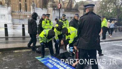 The arrest of protesters in England at the same time as the new government begins
