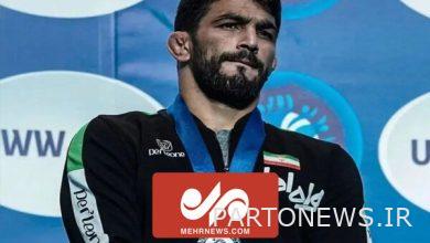 حزن حسن يزداني لحظة تسليم الميدالية بجانب ديفيد تيلور - وكالة مهر للانباء | إيران وأخبار العالم