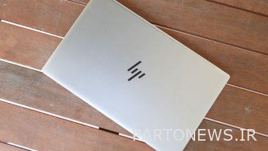 HP Envy 13 on a wooden table