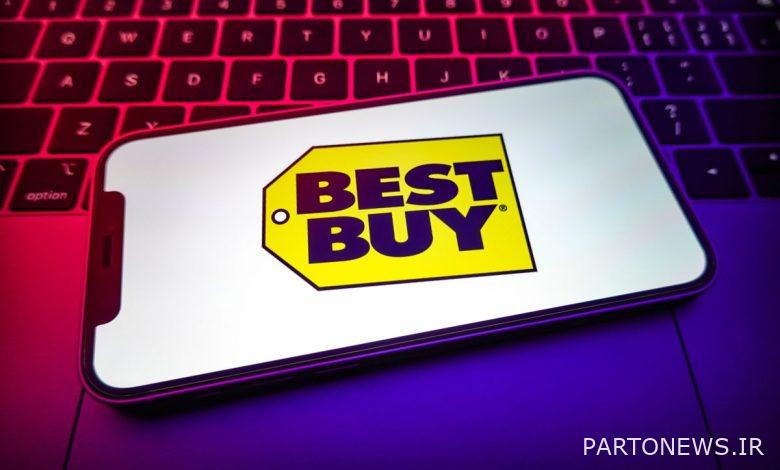Best Buy Black Friday deals — smarphone resting on a laptop