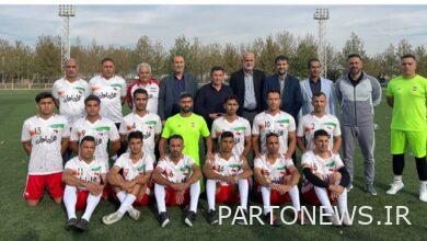 The presence of Nabi and Qalanewi with the raising of the Palestinian flag in the training of the veterans and able-bodied team