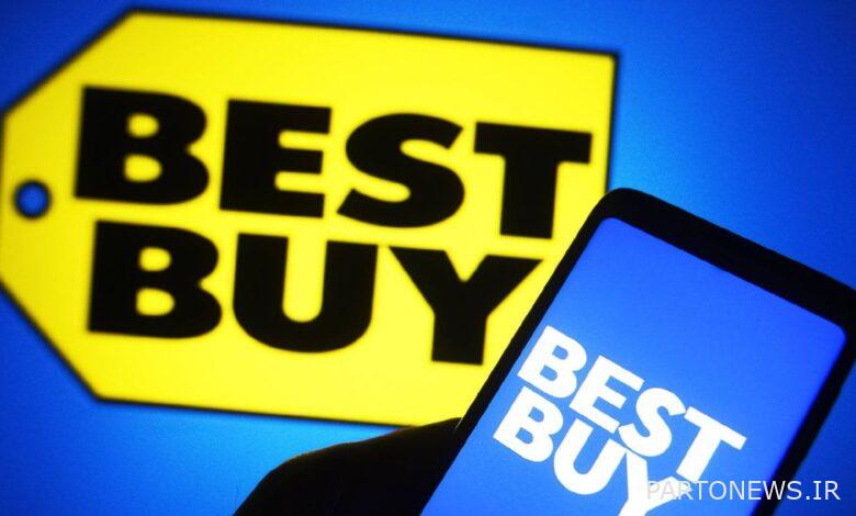 Man holiding phone with best Buy logo with blue background and Best Buy logo