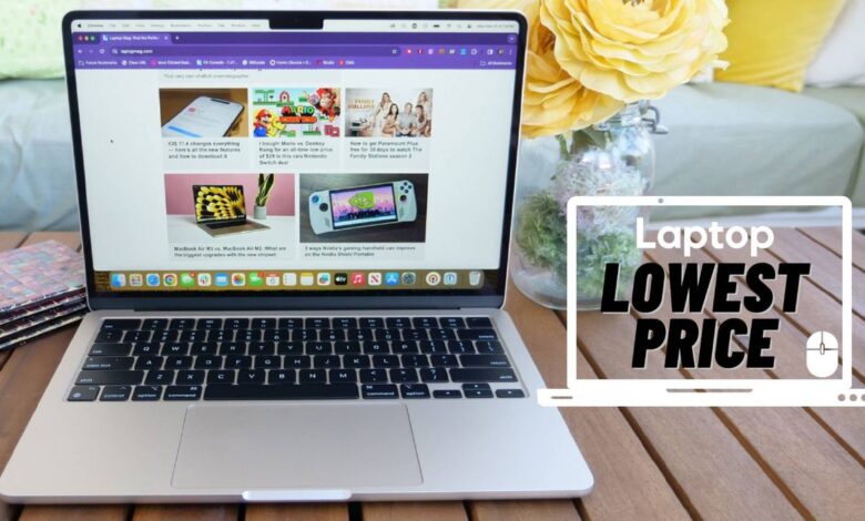 MacBook Air M3 on a wooden tablet next to a vase with yellow rose
