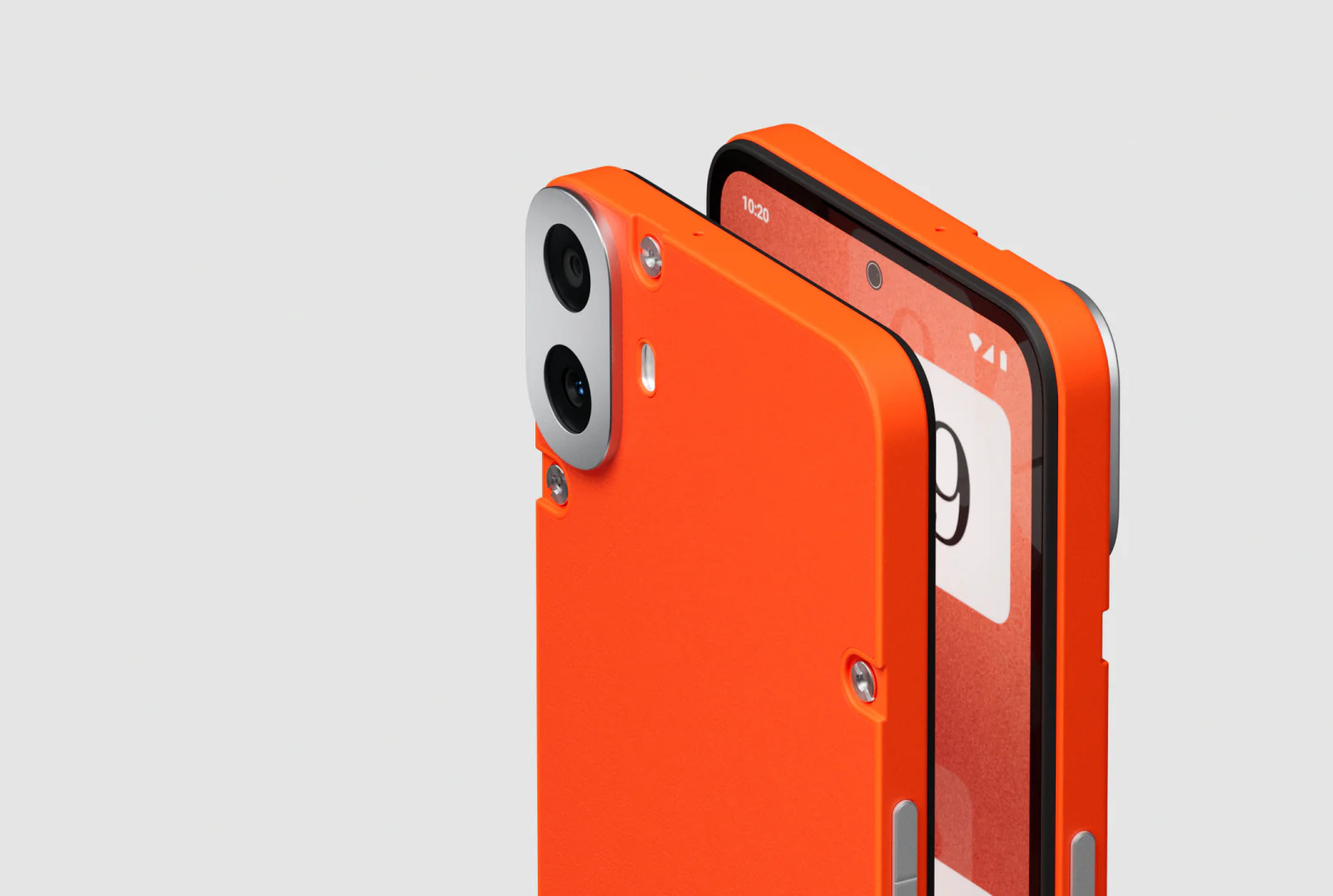 نمای نزدیک از دو CMF نارنجی چهره به چهره توسط Nothing Phone 1