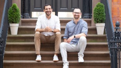 Harmonyze founders sitting on steps