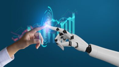 Human hand and robotic hand reaching toward each other and touching fingertips a la Sistine Chapel