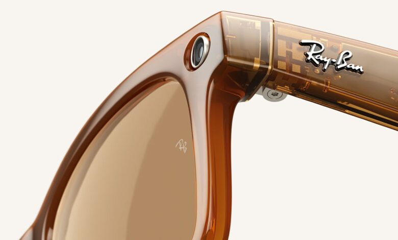 Close up shot of Ray-Ban Meta smart glasses showing Ray-Ban logo with internal circuitry through semi transparent frame