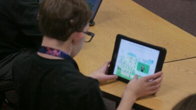 person looking at ASL Aspire screen