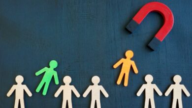 The magnet attracts figures from the crowd. Talent acquisition concept.