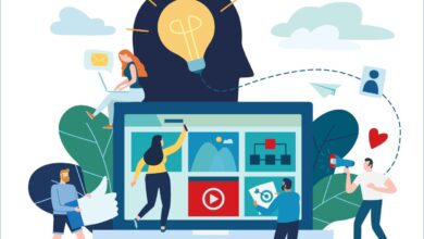 Image of four people around a laptop to represent nonprofits and Big Tech strategizing to improve social media.