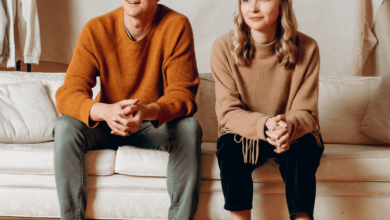 Archive founders Ryan Rowe and Emily Gittins sitting on a couch