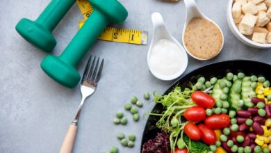 healthy food and hand weights