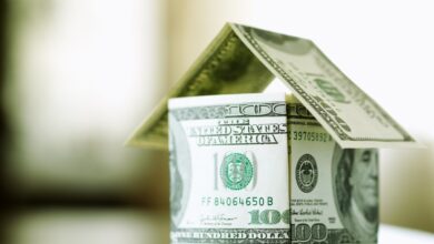 a house made from bills of 100 dollars