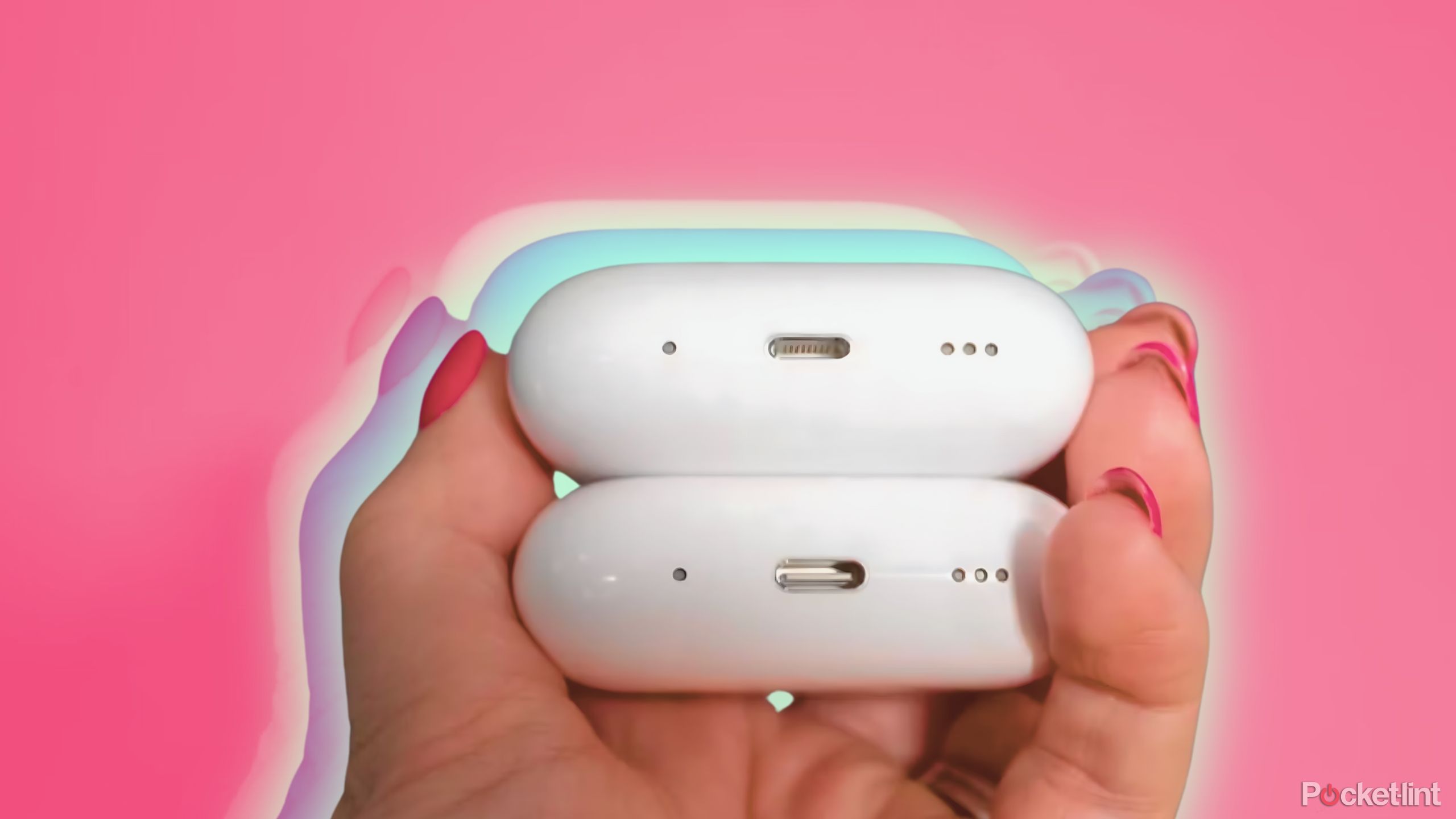 AirPods Pro 2 (USB-C) در مقابل AirPods Pro 2 (صاعقه) در برابر پس زمینه صورتی. 