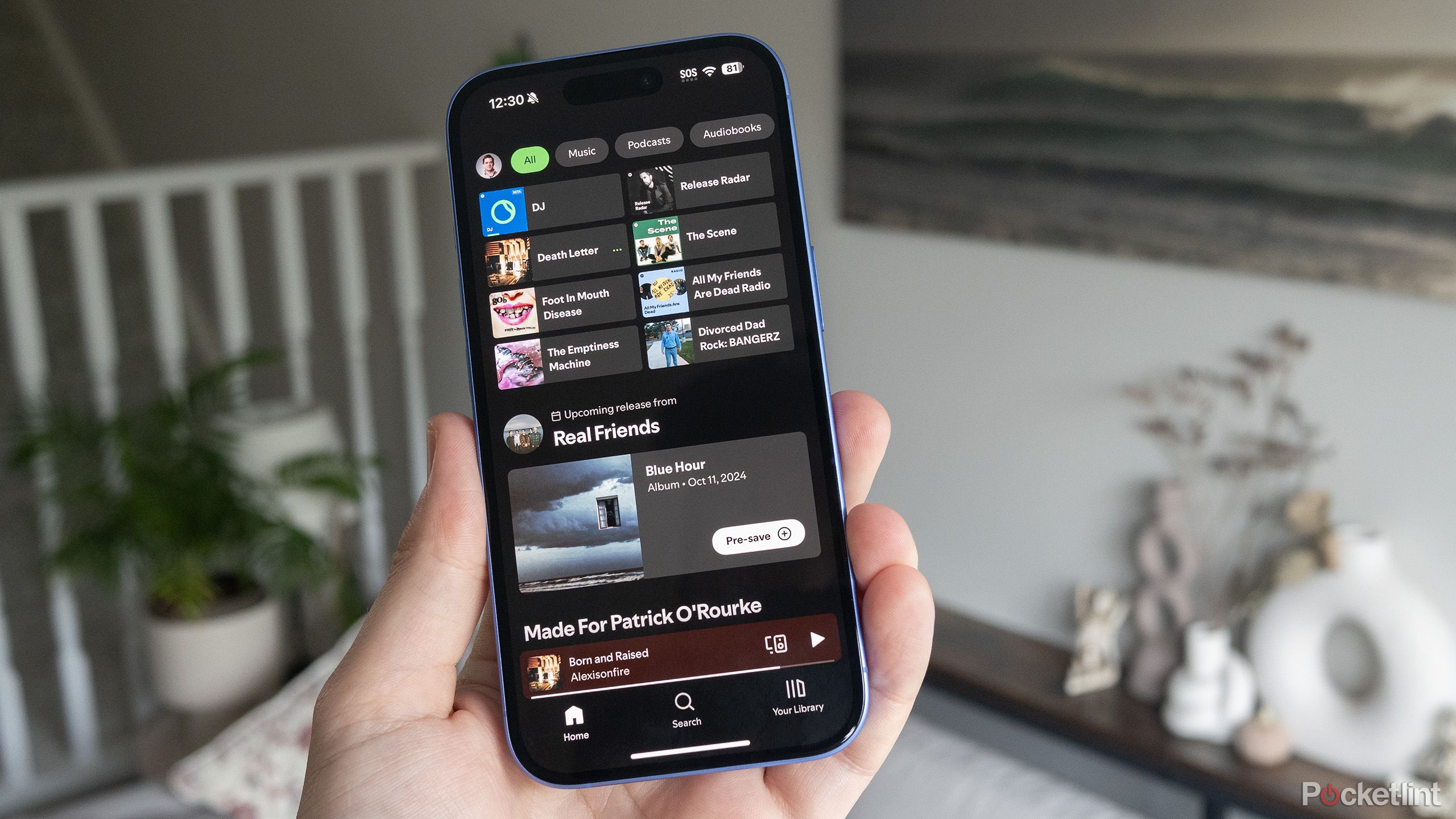 Spotify در آیفون 16. 