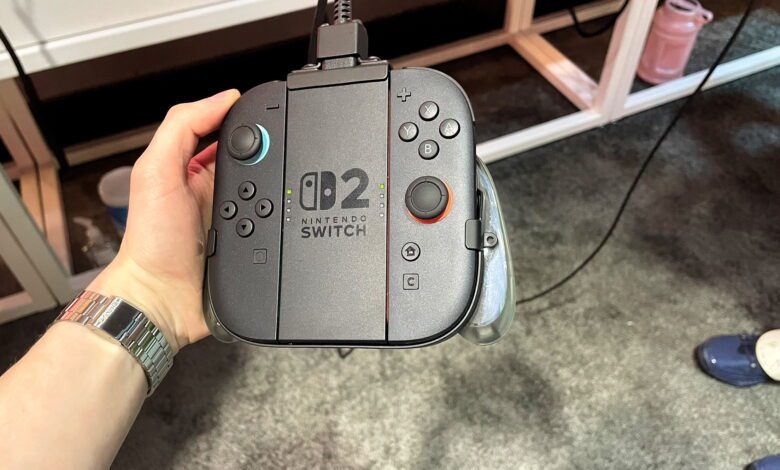 A hand holding the Switch 2 Joy-Cons at the Switch 2 NYC preview event on April 4, 2025