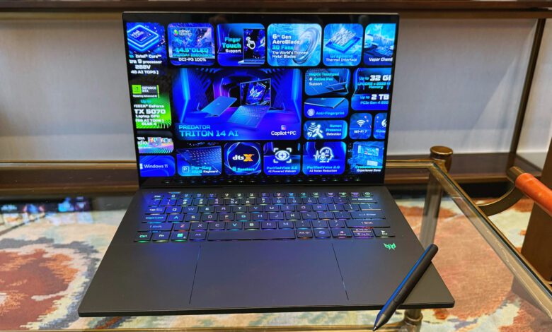 Acer Predator Triton 14 AI gaming laptop on a glass table.
