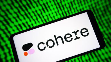 Image of a phone with Cohere's logo on it with a green digital background.