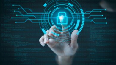 Business person pointing a security lock to show they are securing their low code application.