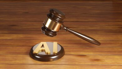 Wooden gavel with brass engraving band and golden alphabets AI on a round wood sound block. Illustration of the concept of legislation of artificial intelligence act and rules
