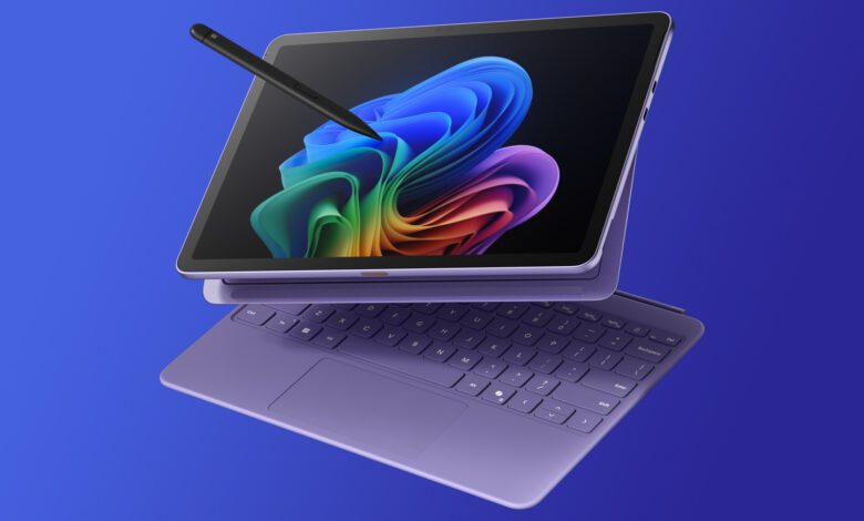 Microsoft Surface Pro 12-inch tablet on a blue and purple gradient background.