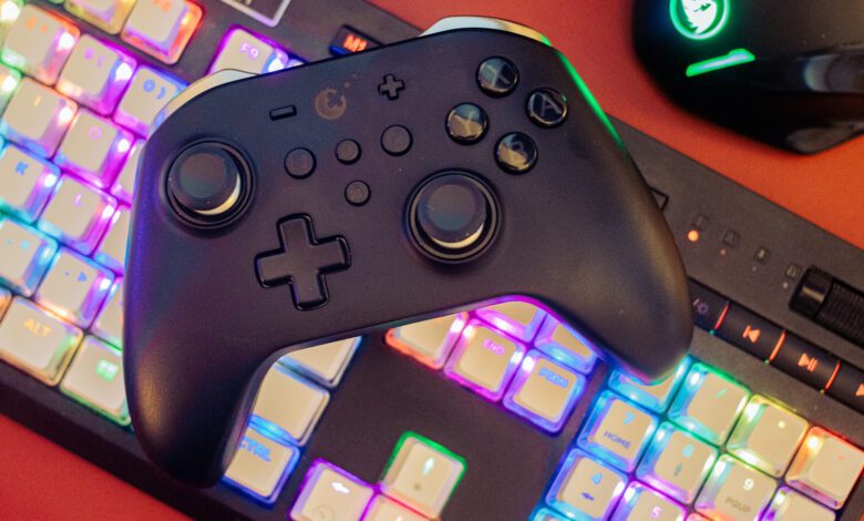 GuliKit KingKong 2 Pro Controller on a keyboard
