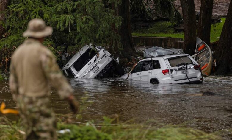 earch and rescue workers search near debris looking for any survivors or remains of people swept up in the flash flooding on July 6, 2025 in Hunt Texas.