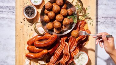 A selection of alternative meat products displayed on a table.