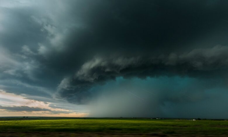 cloud storms over field