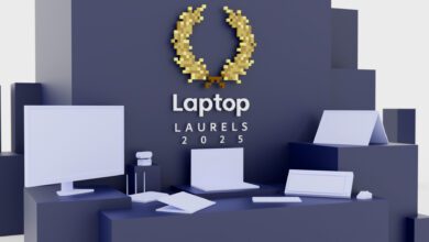 3D render of low-poly computers and computing accessories on podiums, including monitors, webcams, routers, mice, keyboards, and laptops beneath a Laptop Mag 'Laptop Laurels 2025' badge.