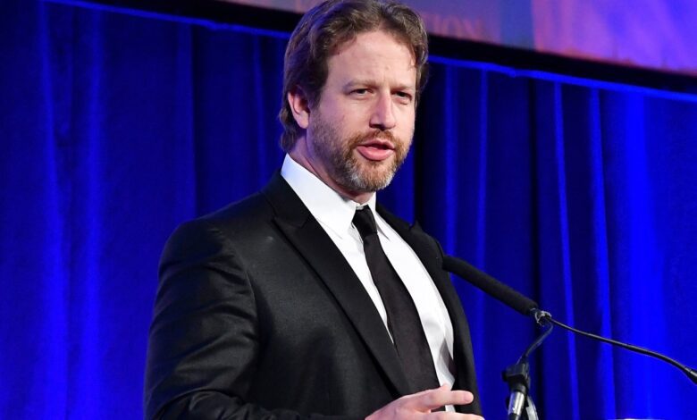 Joe Sanberg speaks at an event.
