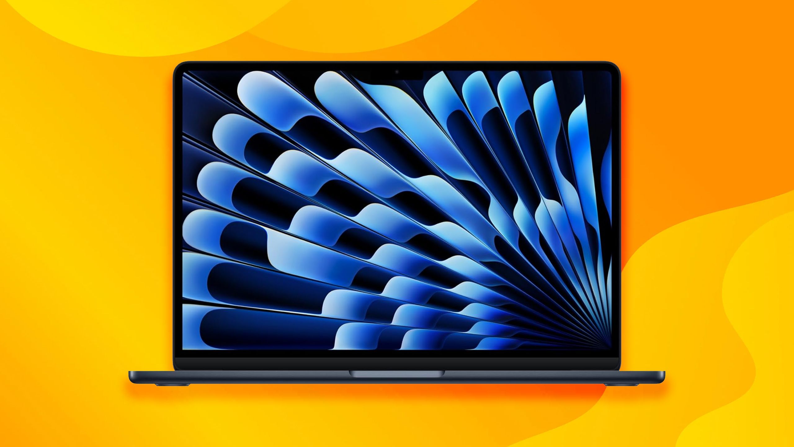 MacBook Air در پس زمینه زرد/نارنجی.