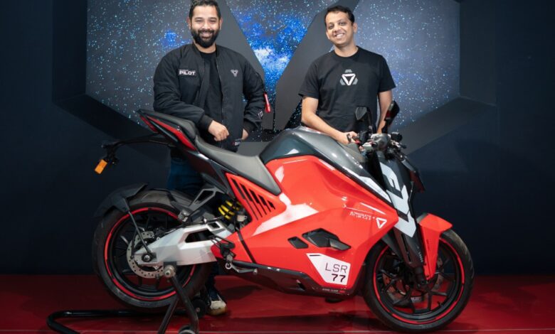 Ultraviolette founders posed with a motorcycle
