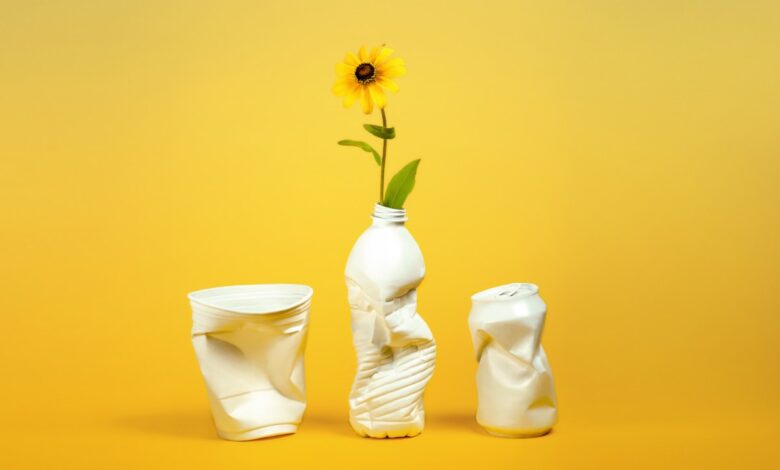 Plastic containers repurposed as vases
